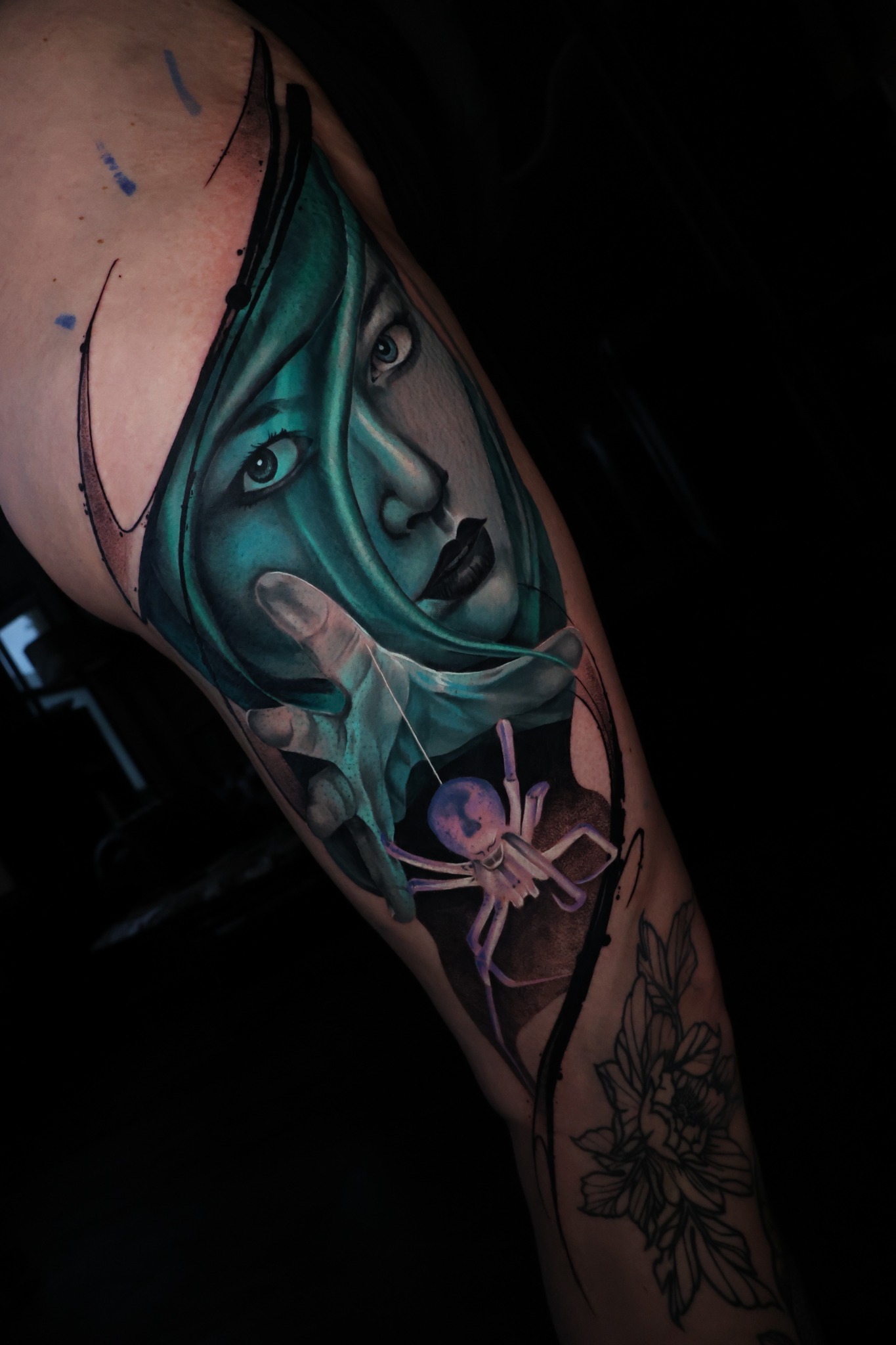 Colour realism tattoo portrait with botanical detail