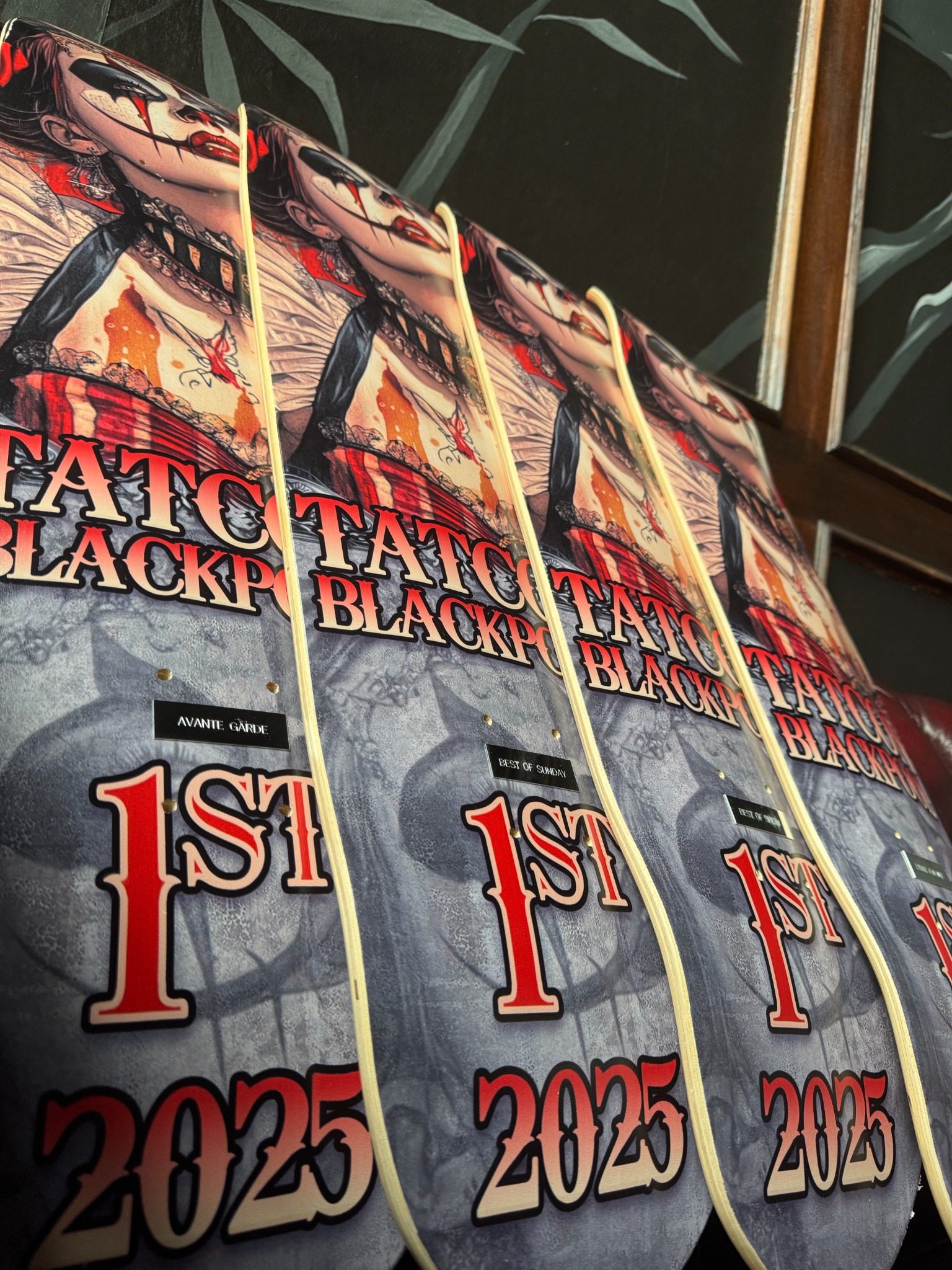 Tattoo convention award boards featuring Kimmi Gayle's wins